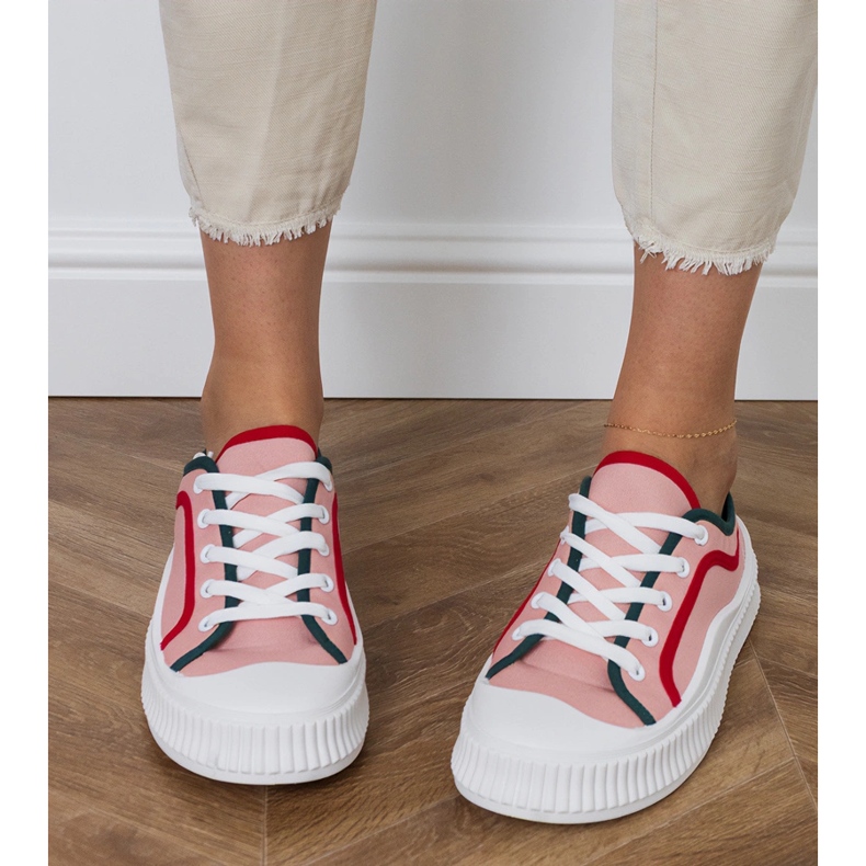Pink women's sneakers on the platform 1