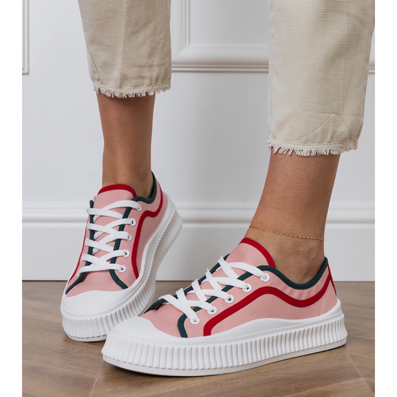 Pink women's sneakers on the platform 2