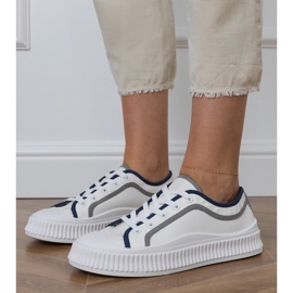 Women's white sneakers on the platform 2