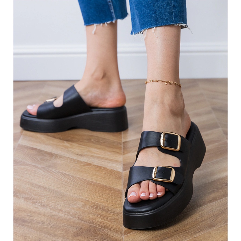 Black flip flops with clamps on stripes 1