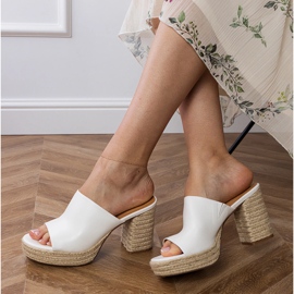 White espadrilles on the post 1
