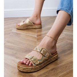 Golden flip flops with clamps on stripes 1