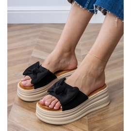 Black platform sandals with a bow 1