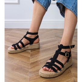 Black espadrilles sandals on a low platform 1