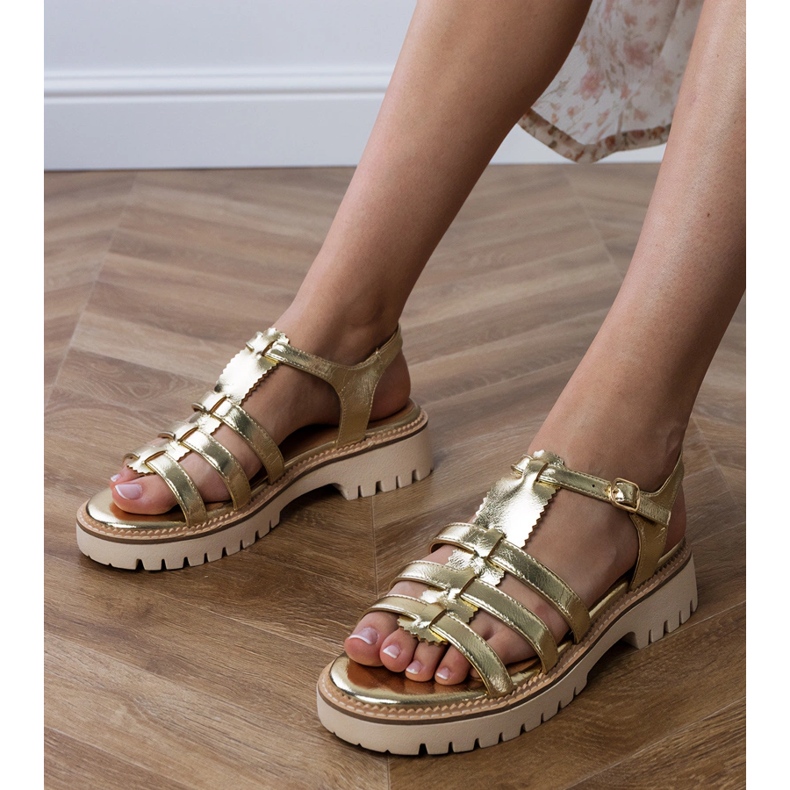 Golden women's sandals with a buckle 1 Golden women's sandals with a buckle 1