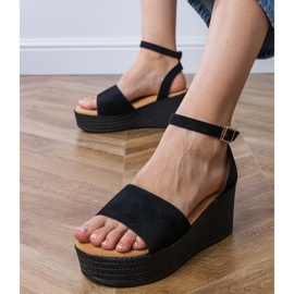 Black sandals on the Ekozamsz platform 2