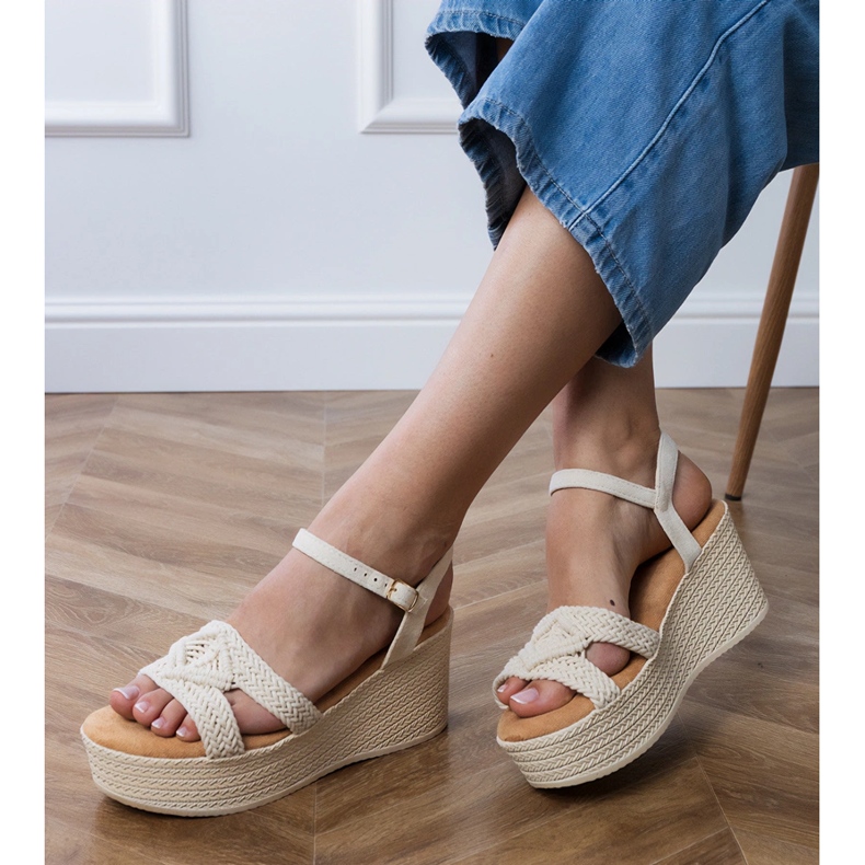 Beige sandals on the platform with a tied strap 2