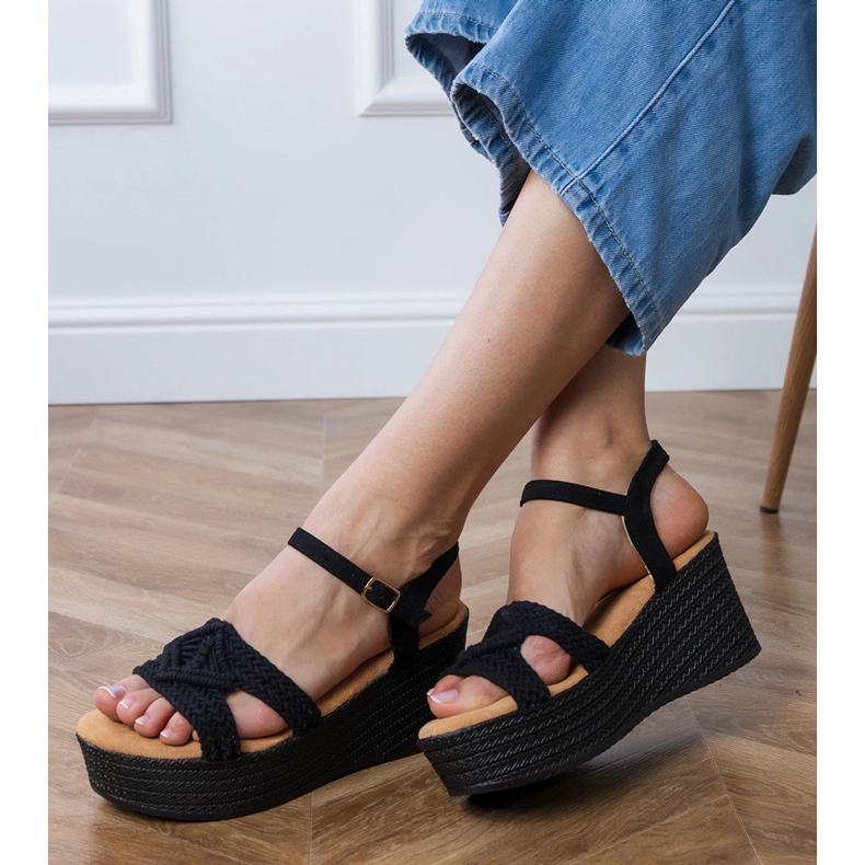 Black sandals on the platform with a tied strap 2