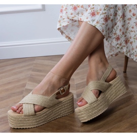 Beige espadrilles sandals on a platform with stripes 2