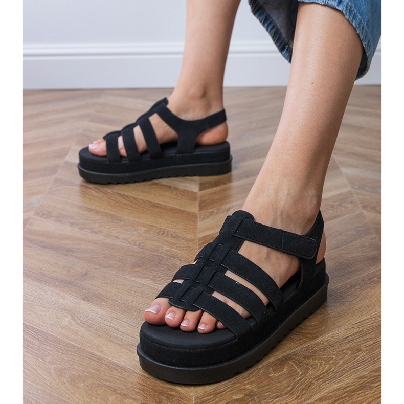 Black gladiator sandals on the platform 2