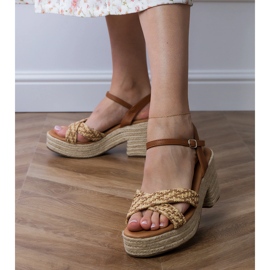 Brown sandals wreated on the post 2