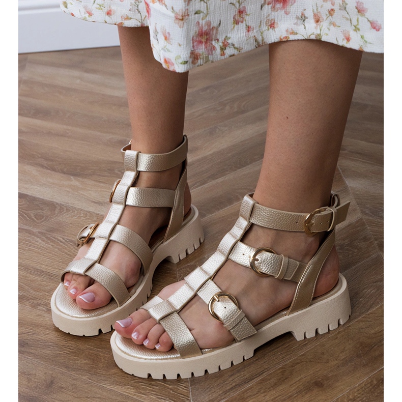 Gold sandals Gladiator fastened with a cube golden 2