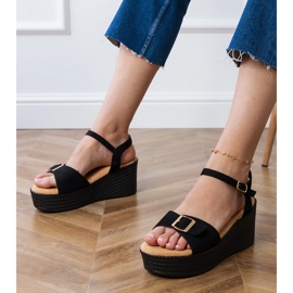 Black women's sandals with a decorative buckle 1