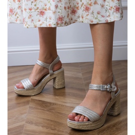 Silver espadrilles sandals on the post 1