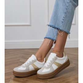 Women's white sneakers on the platform 2