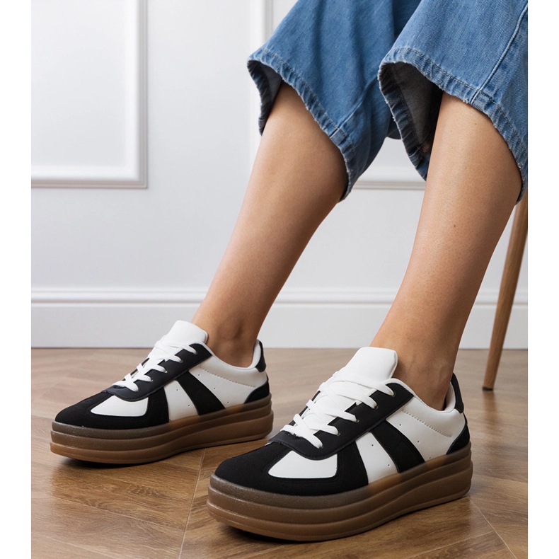 Women's black sneakers on the platform 1