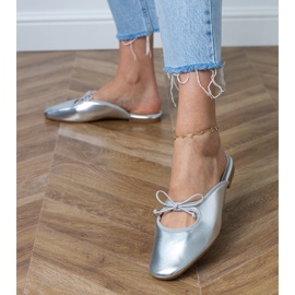 Silver flip -flops built on a flat sole 1