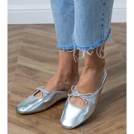 Silver flip -flops built on a flat sole 2