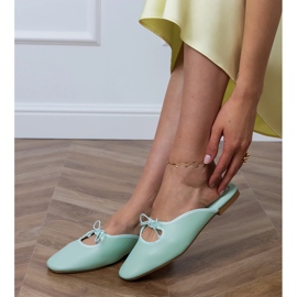 Green flip -flops built on a flat sole 2