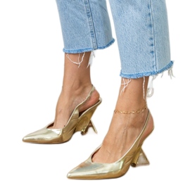 Gold sandals on a geometric wedge golden 1