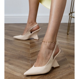 Beige sandals on a geometric wedge 2