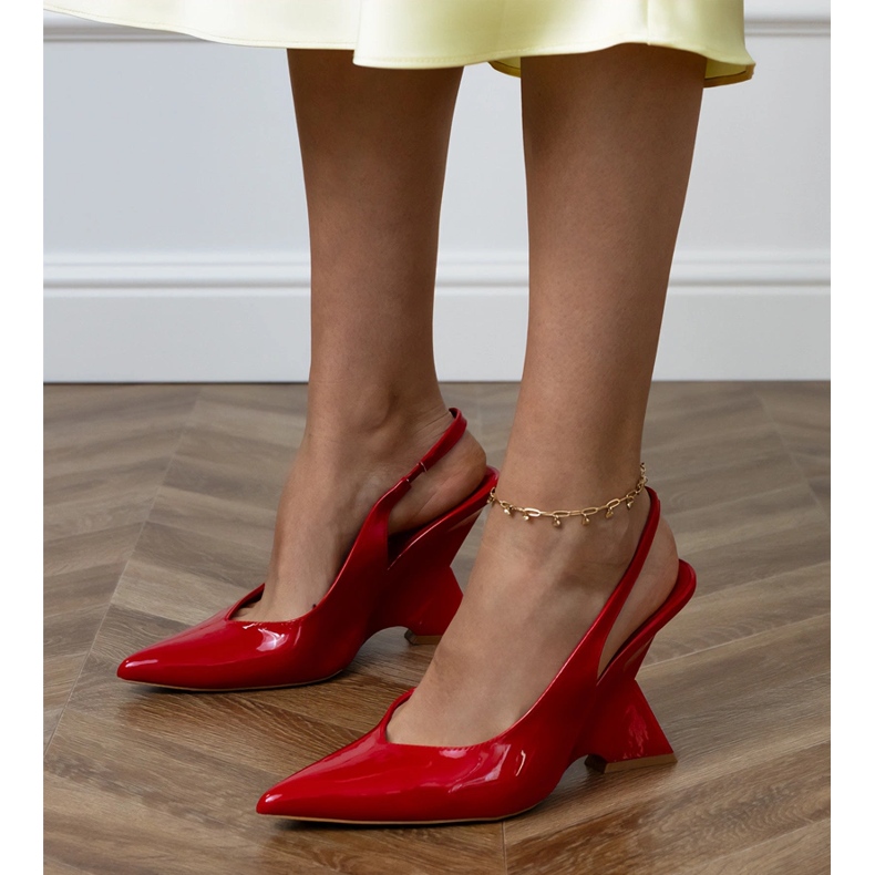 Red sandals on a geometric wedge 1