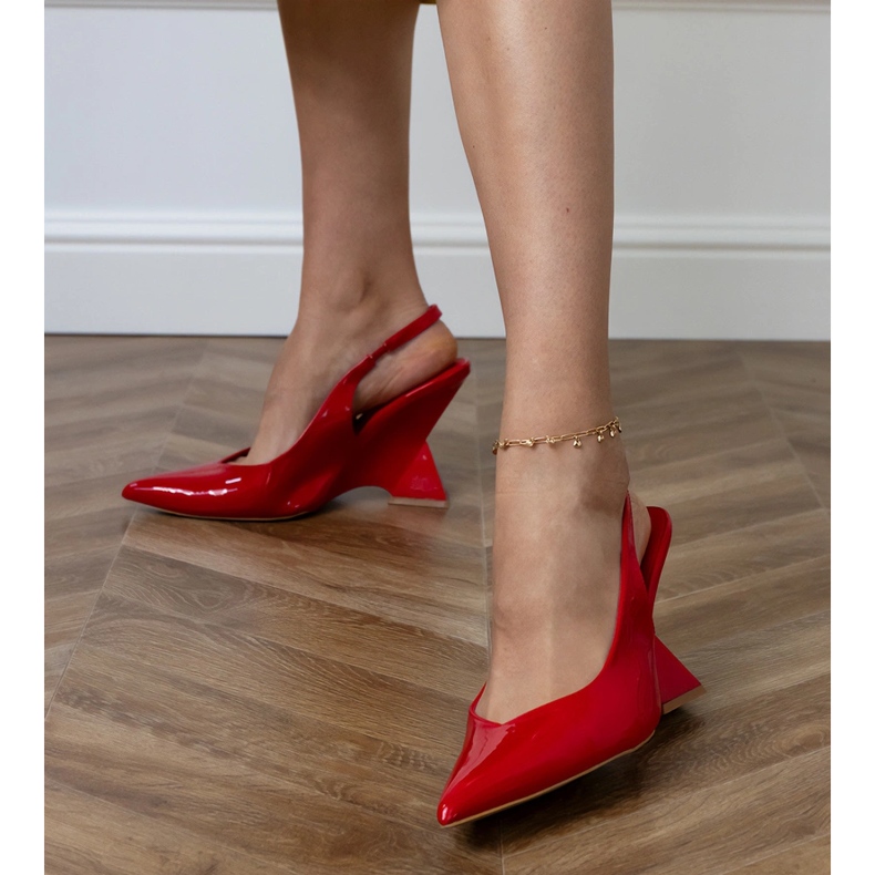 Red sandals on a geometric wedge 2