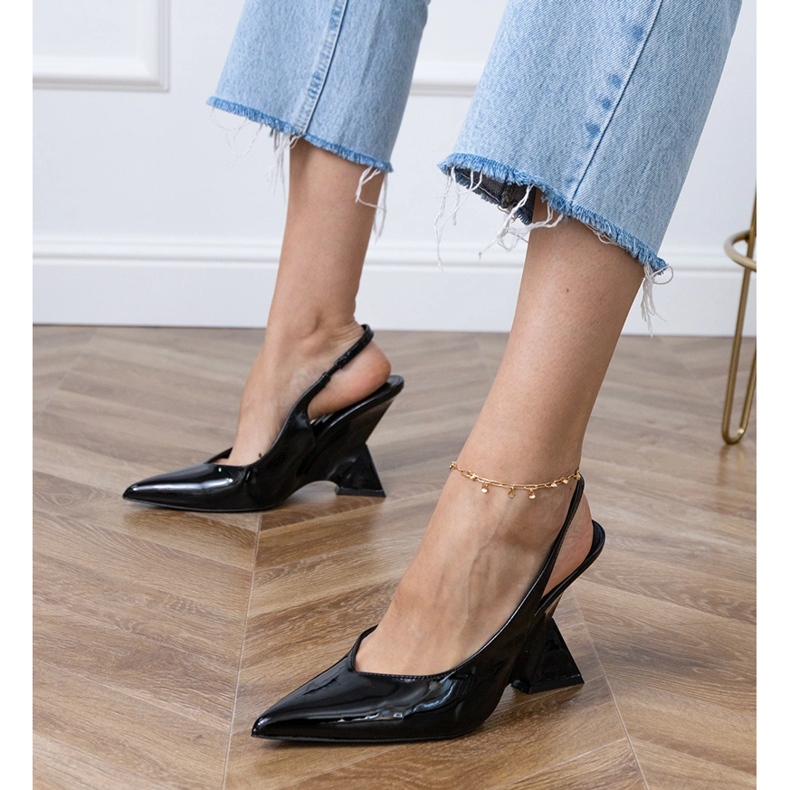 Black sandals on a geometric wedge 1