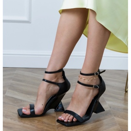 Black sandals with a belt on a geometric wedge 2