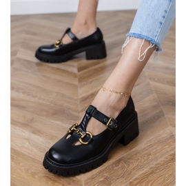 Black shoes on a thick sole with a golden decoration 2 Black shoes on a thick sole with a golden decoration 2