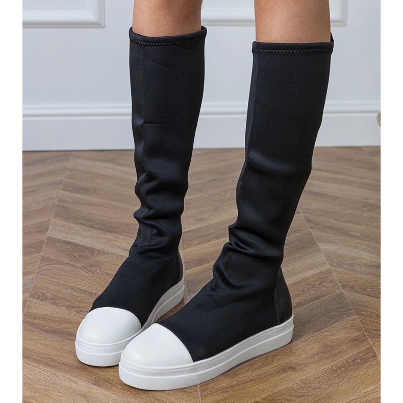 Black material sports boots with an elastic upper 2