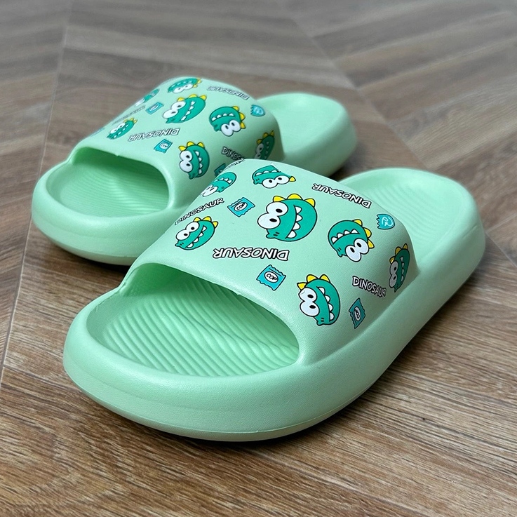 Green children's flip flops with print 1