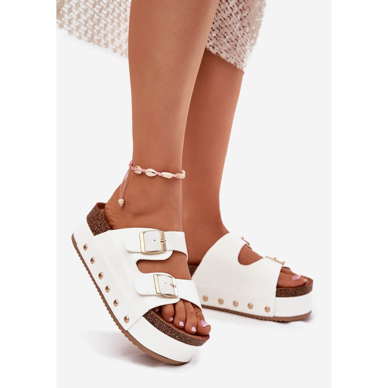 Women's flip flops with buckles on a massive platform white 2