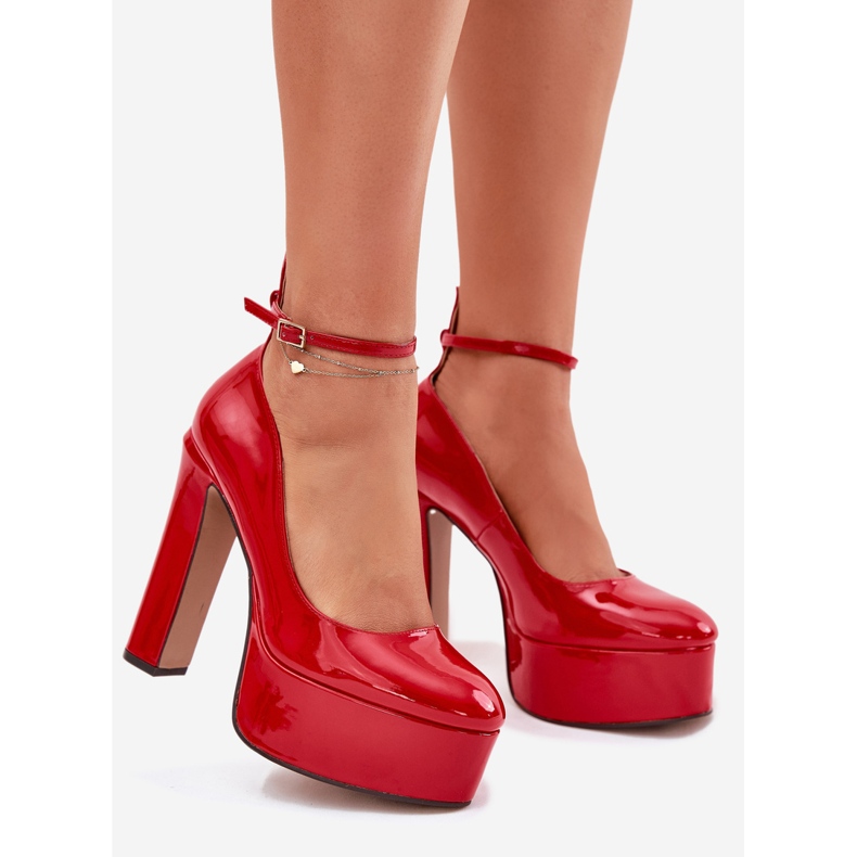 Painted pumps on a high post and red platform 1