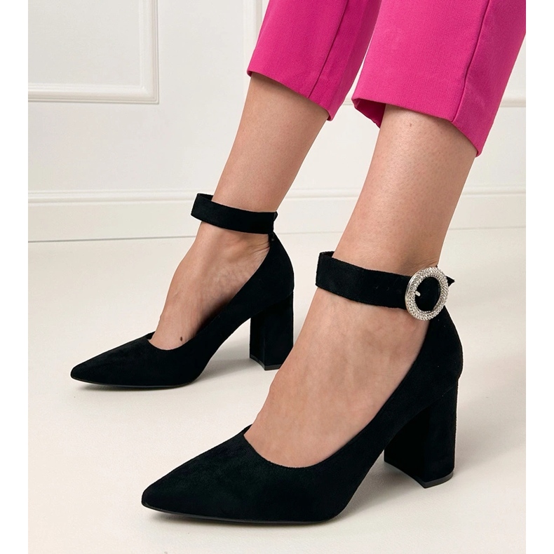 Black pumps on the post with a buckle and zircons 1