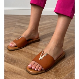 Brown flip -flops with a golden decoration 1 Brown flip -flops with a golden decoration 1