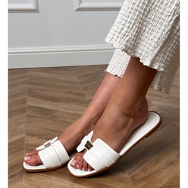 White women's flip flops with an ornament on the belt 2