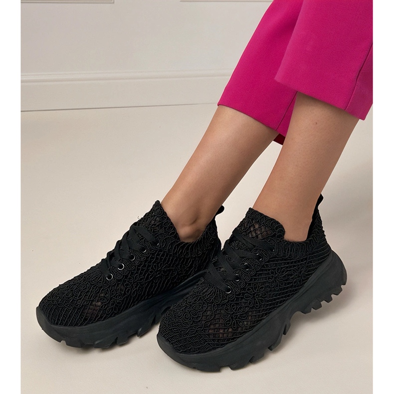 Black openwork sneakers on the platform 2
