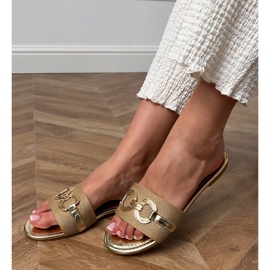 Golden flip flops with a golden decoration on the belt 1 Golden flip flops with a golden decoration on the belt 1