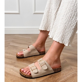 Beige flaps with clamps on a cork sole 1