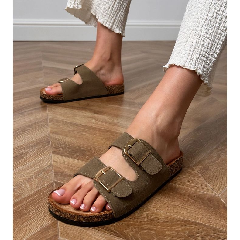 Green flip flops with clamps on a cork sole 2