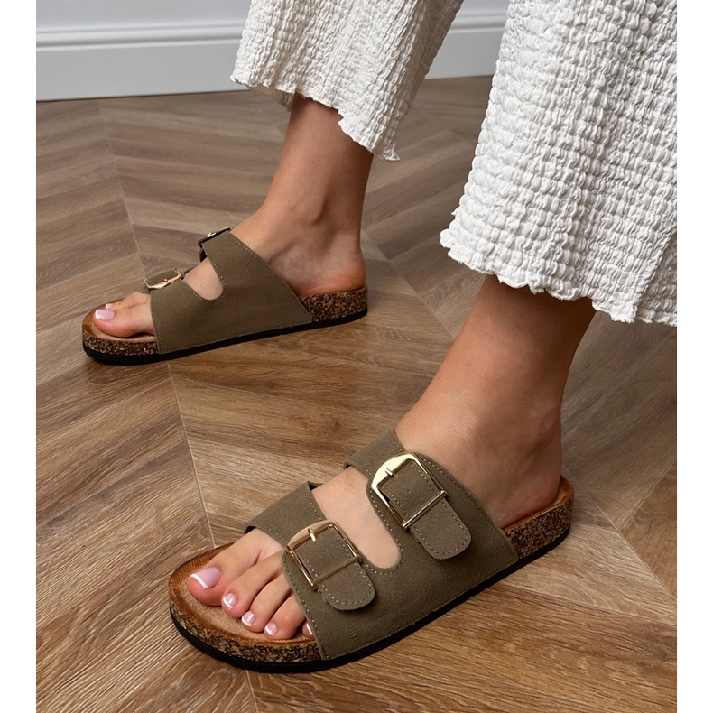 Green flip flops with clamps on a cork sole 1