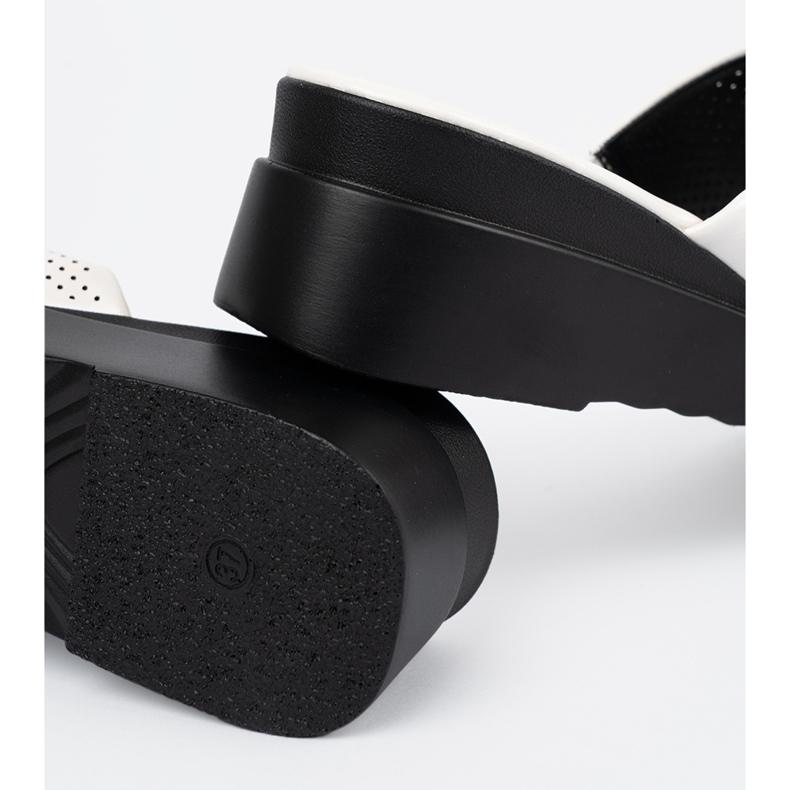 Seastar White openwork flip flops on the platform 1