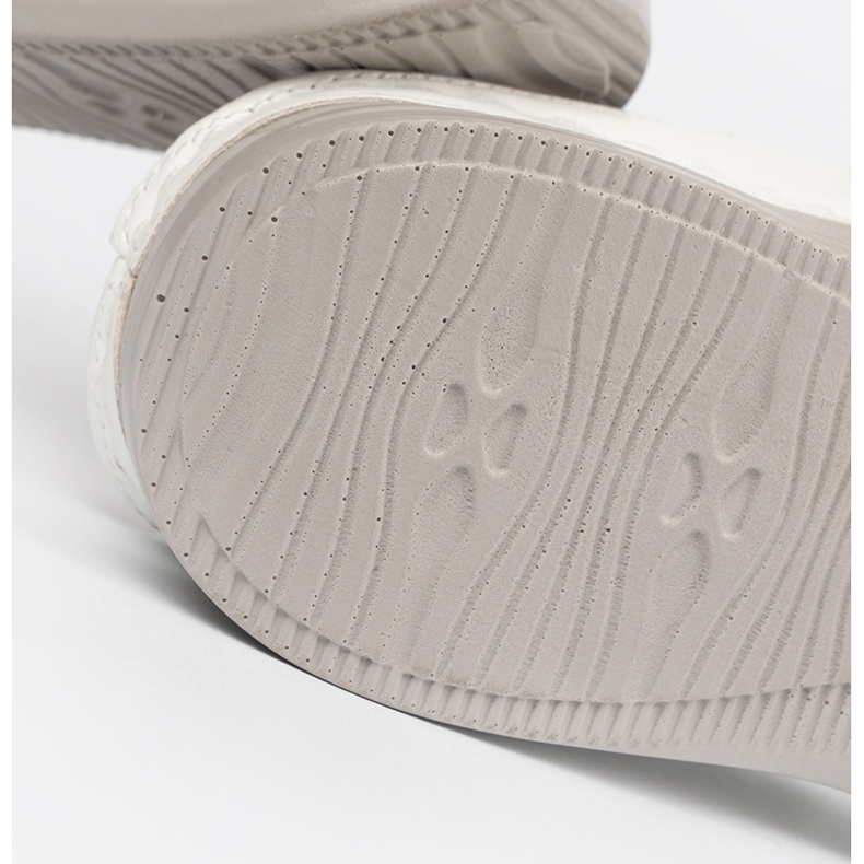 Seastar White flip flops with a full nose and a buckle 2