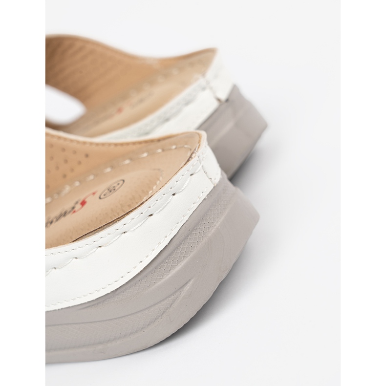 Seastar Light white flip flops on a low wedge 1