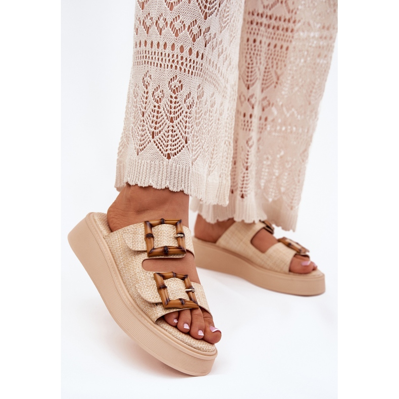 Women's flip flops on the platform with beige buckles 1