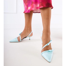 Green pumps with bows and an open heel 1