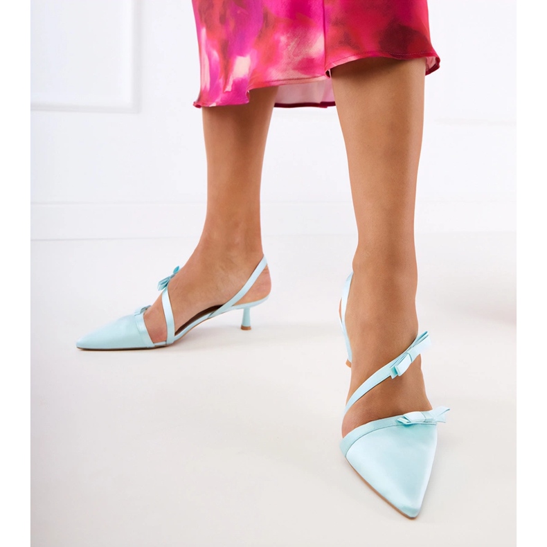 Green pumps with bows and an open heel 1