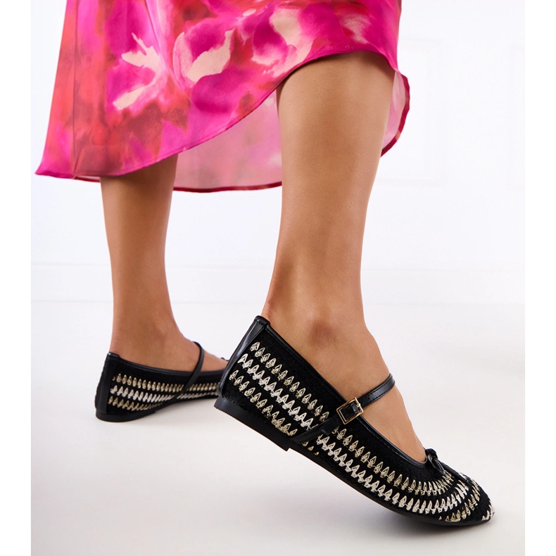Black material ballerinas with a buckle and a bow 1
