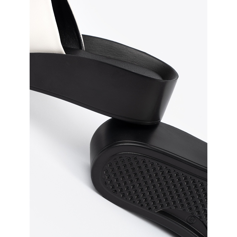 Goodin Black and white flip flops on a low wedge 1